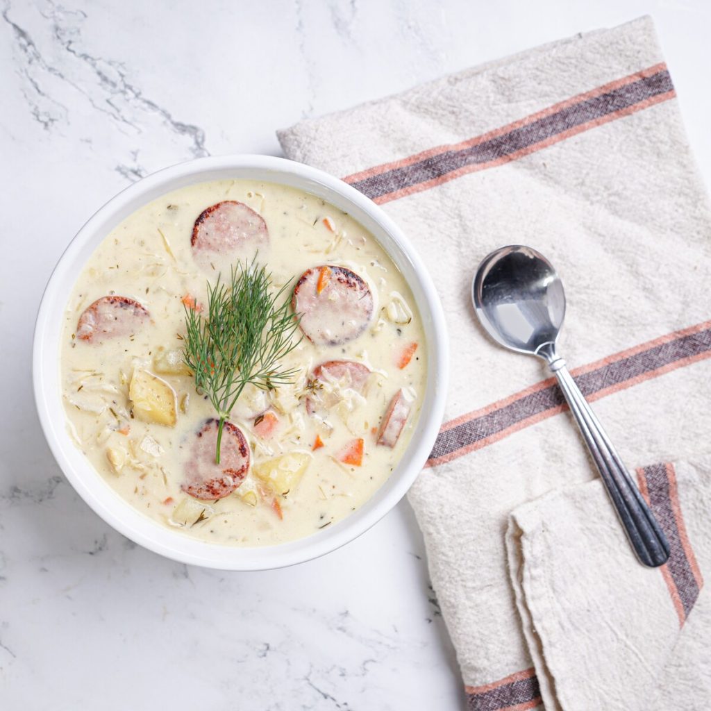 Recipe photo of creamy kraut and Reuben soup with a spoon