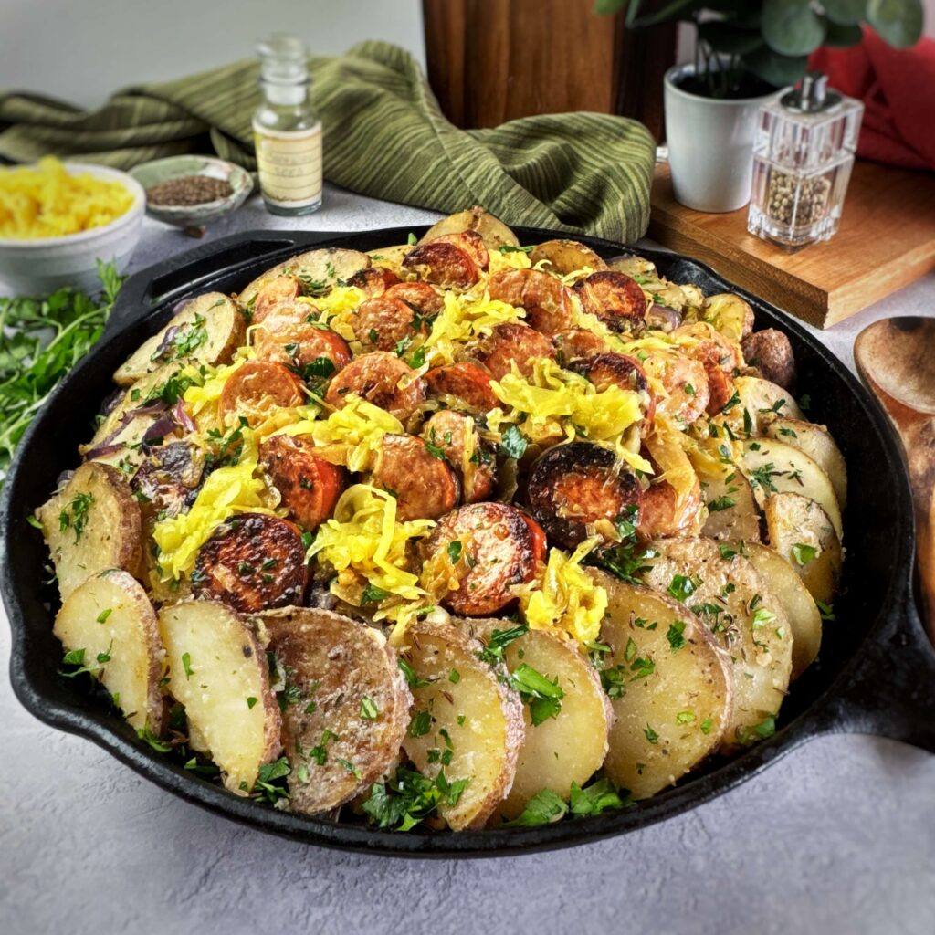 Smoked Sausage, Mustard Kraut and Potato skillet meal in a pan