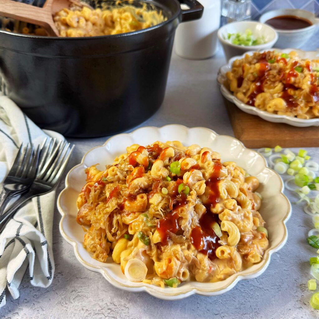BBQ kraut Mac and Cheese in a white dinner bowl