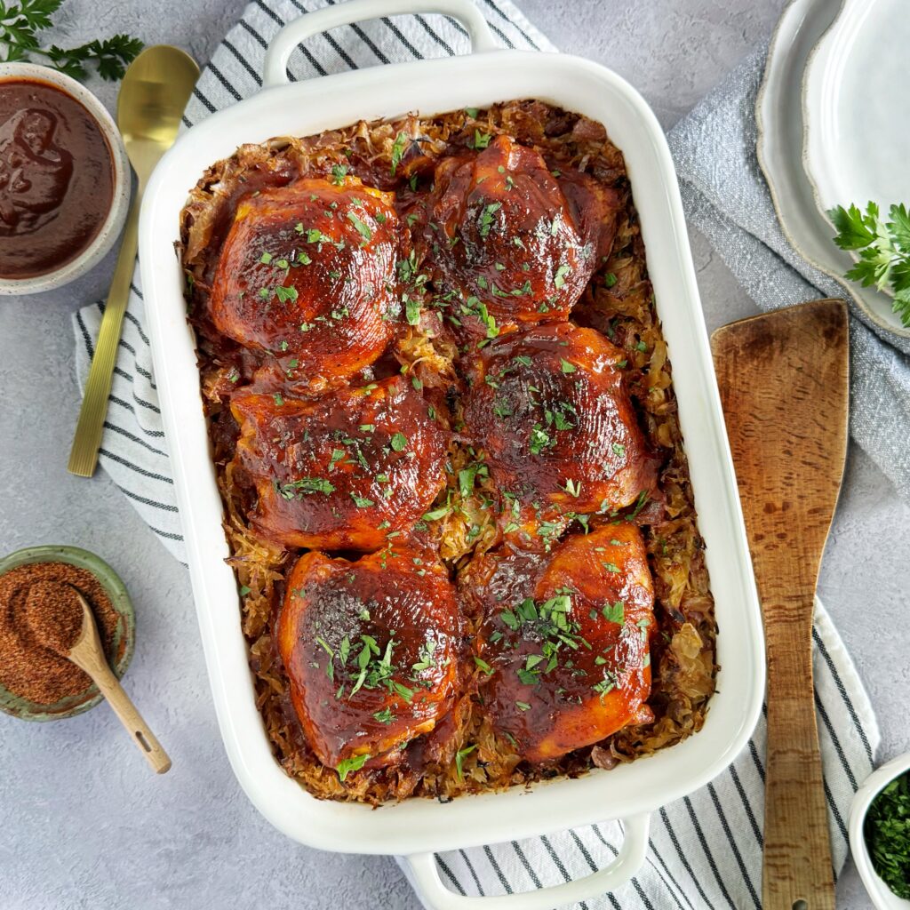A white baking pan of BBQ kraut and Chicken Bake.