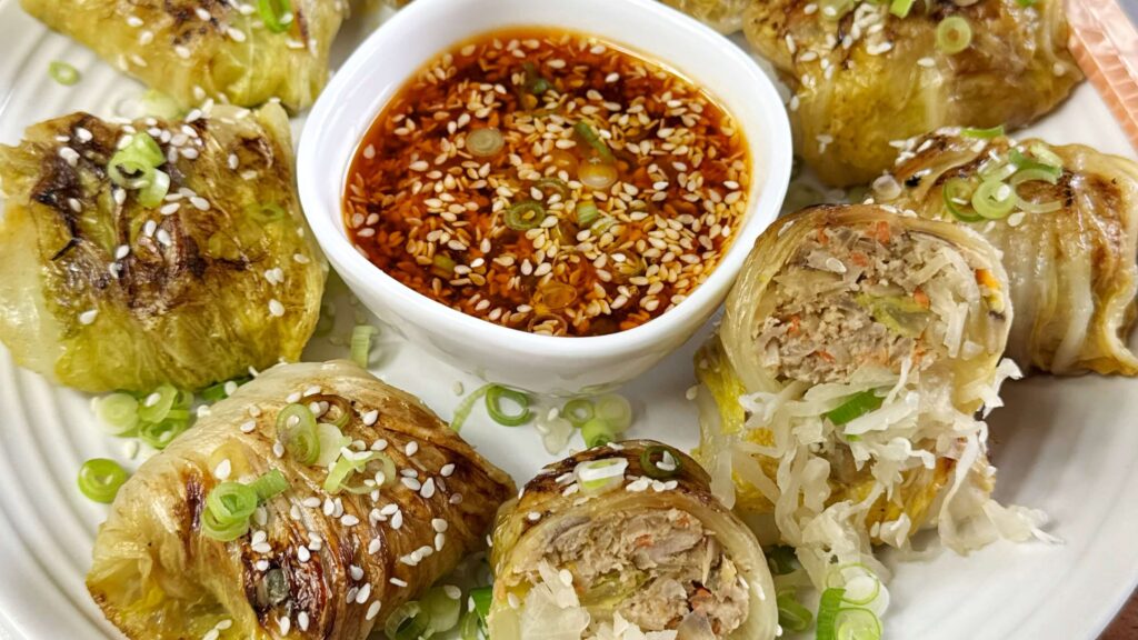 Kraut and Pork Stuffed Cabbage Dumplings with Dumpling Sauce