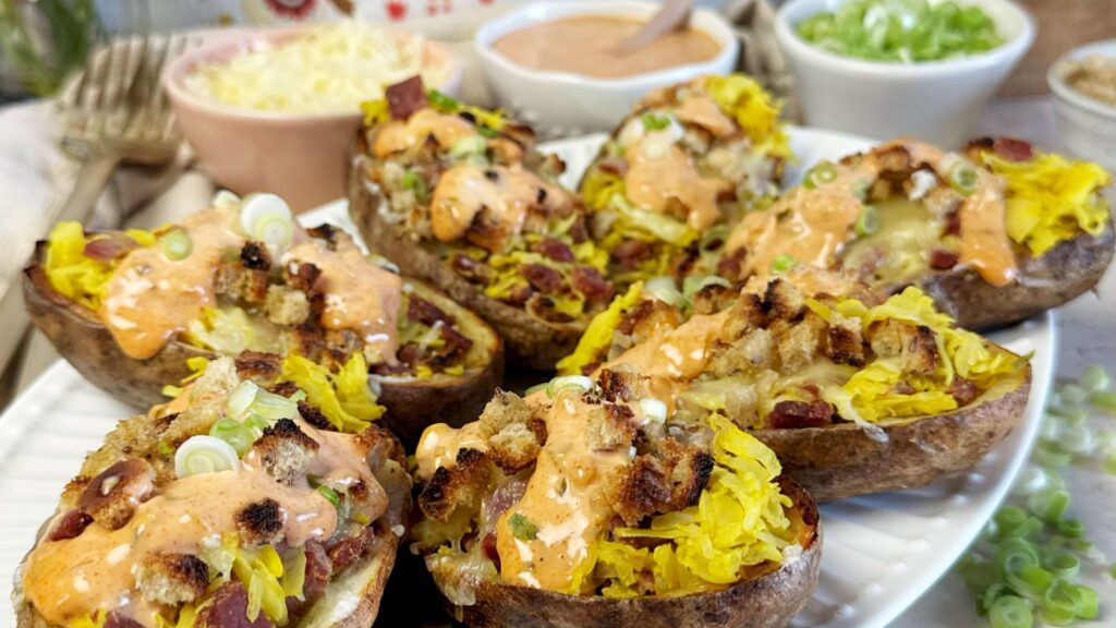 Reuben Potato Skins with Mustard Kraut, Rye Breadcrumbs, and Homemade Thousand Island Dressing