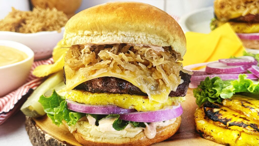 Burger with Grilled Pineapple, BBQ Kraut, and BBQ Mayonnaise